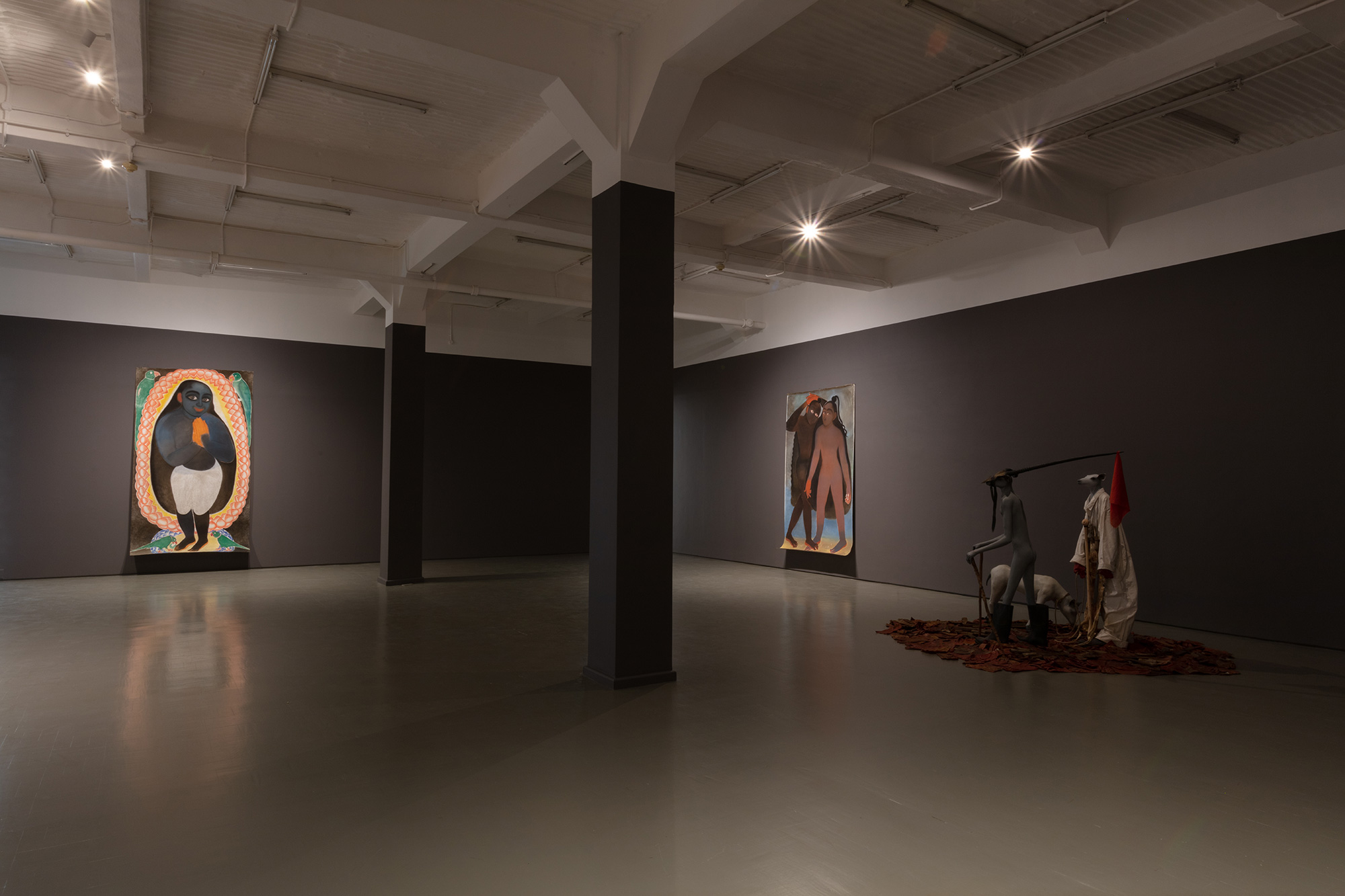 Installation view with (left) Shine Shivan, <em>Banke</em> and <em>Mitr</em>; (right) Jane Alexander, <em>Harbinger</em> (2004) with <em>ghost</em> (2007) and <em>hobbled ruminant</em> (2003-04)
